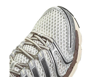 Adidas Adistar Control 5 Cloud White vista laterale — mesh bianco running stabilità