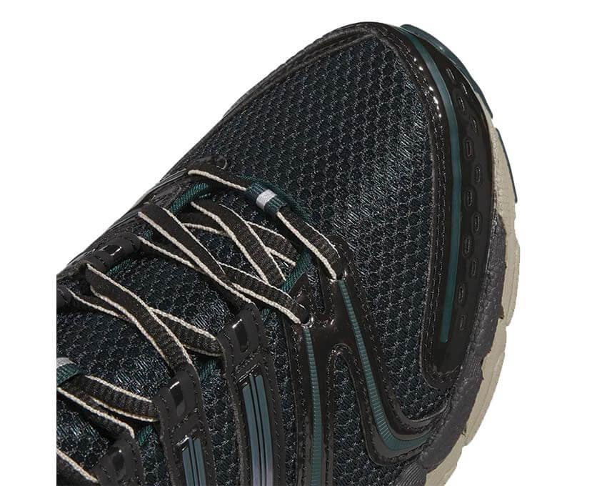 Adidas Adistar Control 5 Core Black vista laterale — mesh nero running stabilità