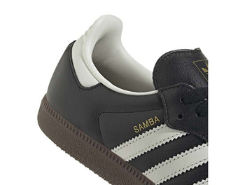 Adidas Samba OG W Black White Gold vista lateral — perfil icónico banda dorada