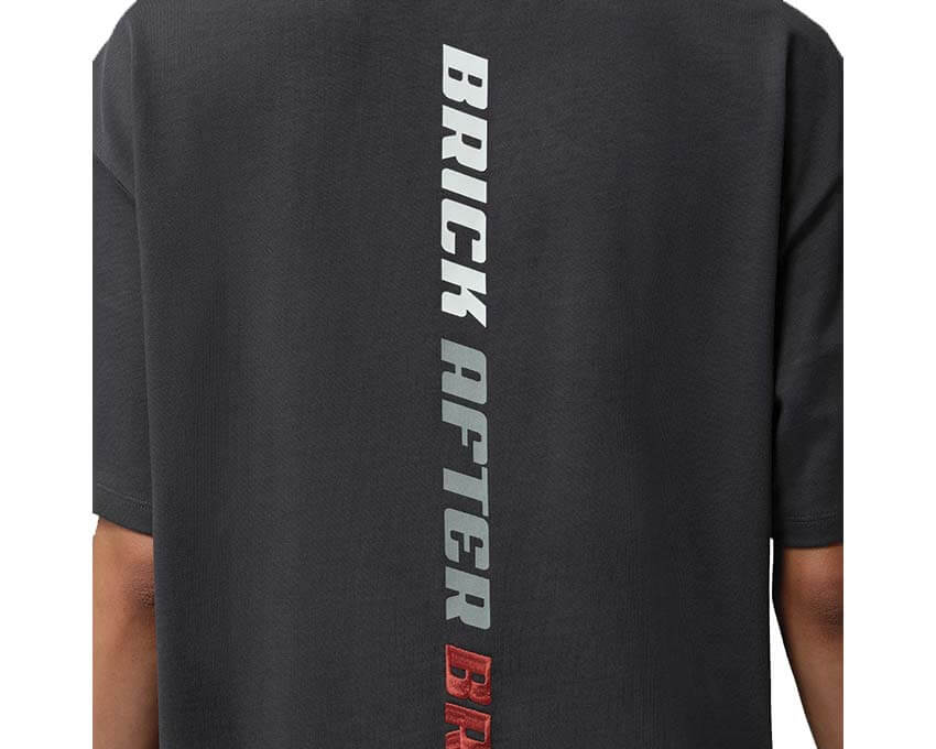 Jordan BIKE AIR Nigel Sylvester Tee Anthracite — sfondo bianco t-shirt collezione Jordan