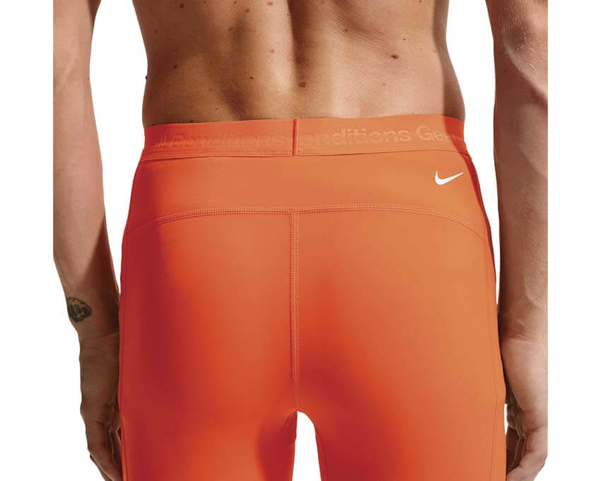 Nike ACG Wildsee Dri-FIT Tights vista posteriore — leggings trail uomo arancione ACG