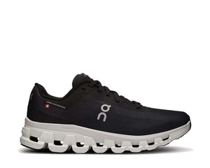 On Cloudflow 4 W Black/White — zapatilla running mujer CloudTec reactivo rápido
