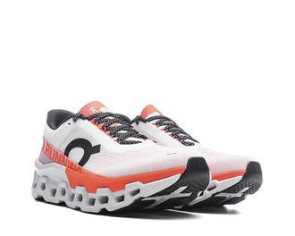 On Cloudmonster 2 White/Flame vista laterale — tomaia in mesh traspirante