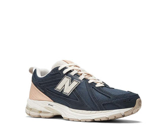 vista lateral — New Balance 1906 navy beige mesh ante caña