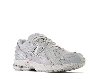 New Balance 1906 Protection Pack vista frontal – materiales reflectantes